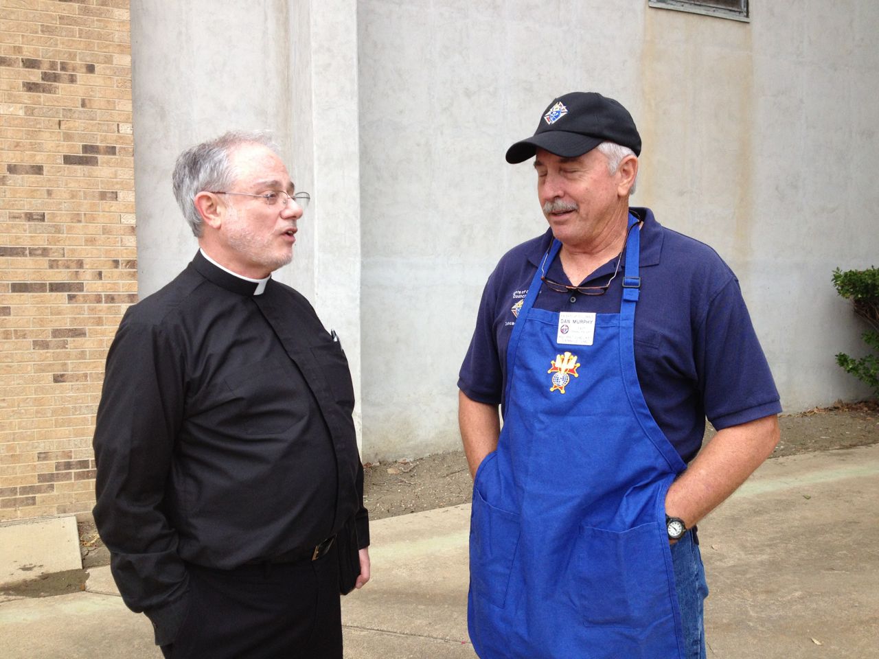 Dan Murphy, Community Director visits with Very Rev. Jim Swift, Rector of Holy Trinity Seminary