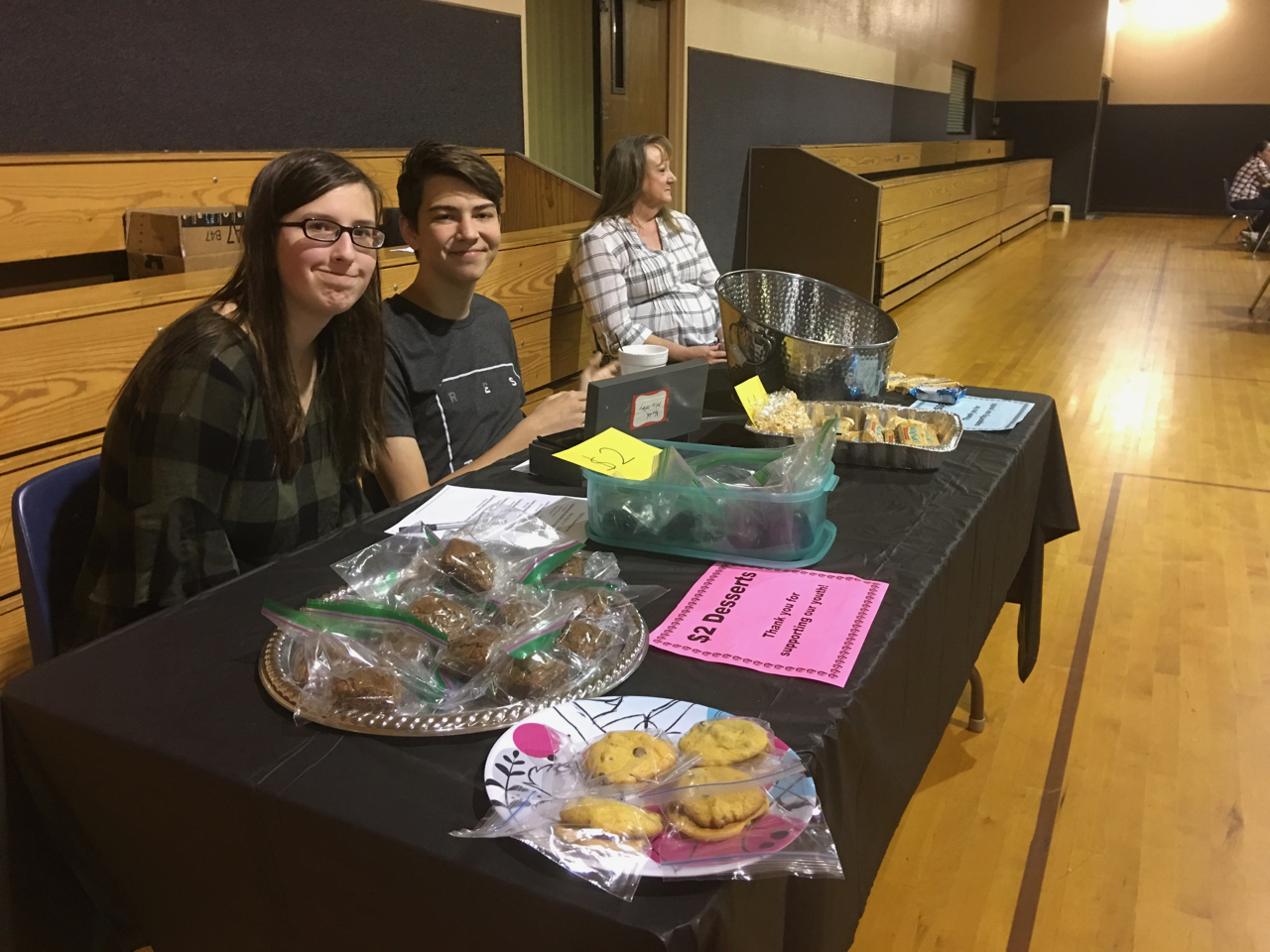 Youth selling baked goods at fish fry