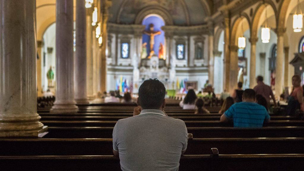 catholics-praying-in-church