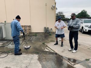 Jose Montoya power washing concrete